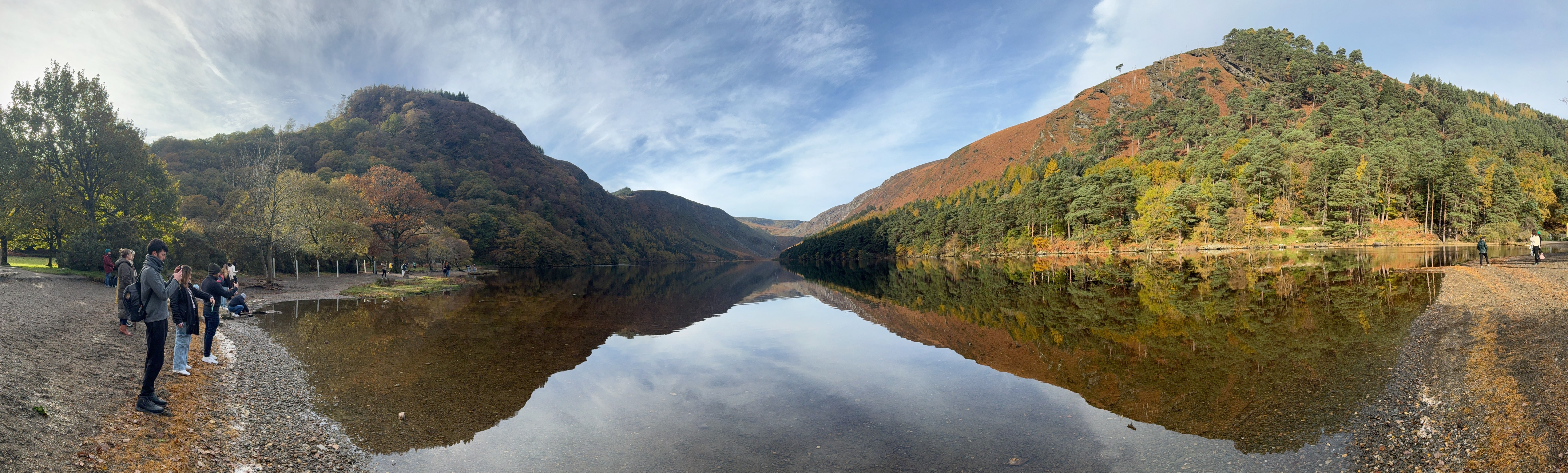 Panoramic photograph of a lake in Glendalough, Ireland.